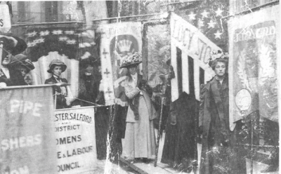 Suffragists marching on 17th June 1908 with their banners
